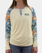 Front view of women’s Erin UPF 50+ Henley fishing shirt in blue and orange tropical print