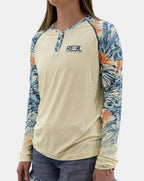 Three-quarter front view of women’s Erin Henley fishing shirt in blue and orange tropical print