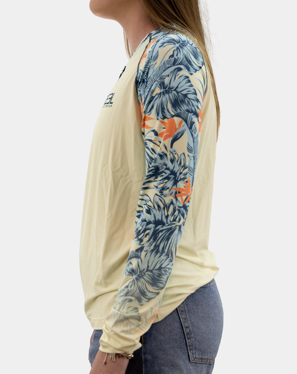 Left-side view of women’s Erin long-sleeve fishing shirt with tropical-print sleeves